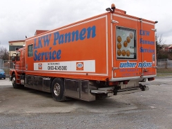 Scania-113-M-320-orange-Holz-200406-02