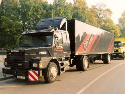 Scania-113-M-320-schwarz-Hensing-101205-01