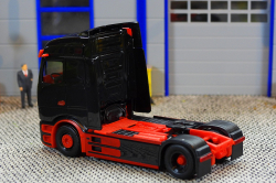 20260221-IMB-eActros-schwarz-rot-01011